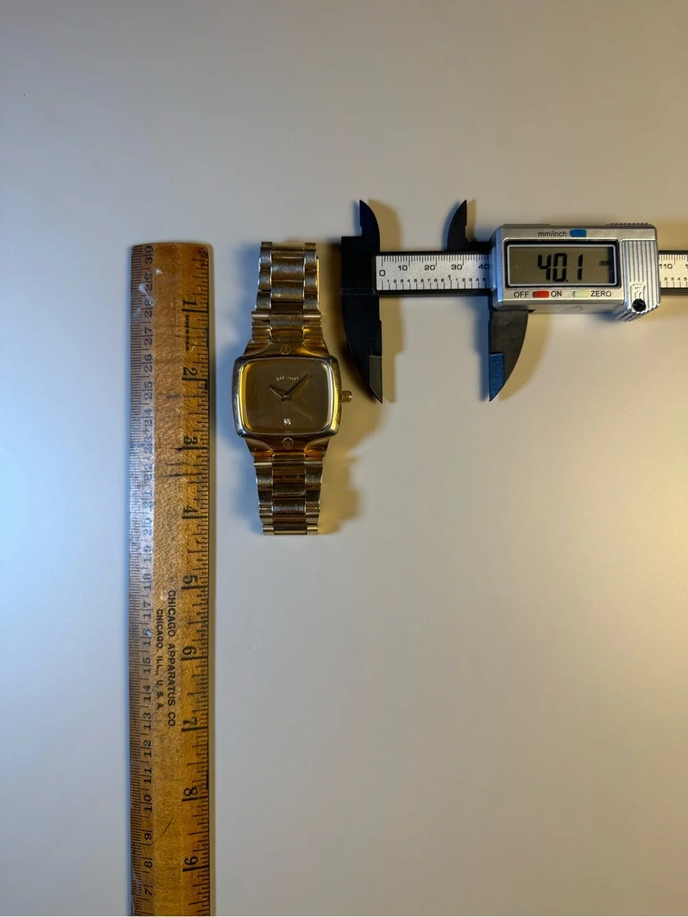 Nixon “The Player” Gold-Tone Square Dial Men's Bracelet Watch w/ real diamond.